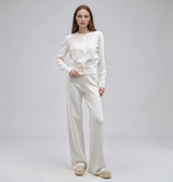 White knit set with a button-front crew-neck cardigan and wide-leg pants, women's soft knit two-piece.