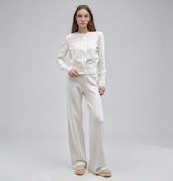 White knit set with a button-front crew-neck cardigan and wide-leg pants, women's soft knit two-piece.