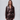 Chocolate brown faux-leather set with a belted shirt jacket and draped lace-trim midi skirt, women's evening two-piece.